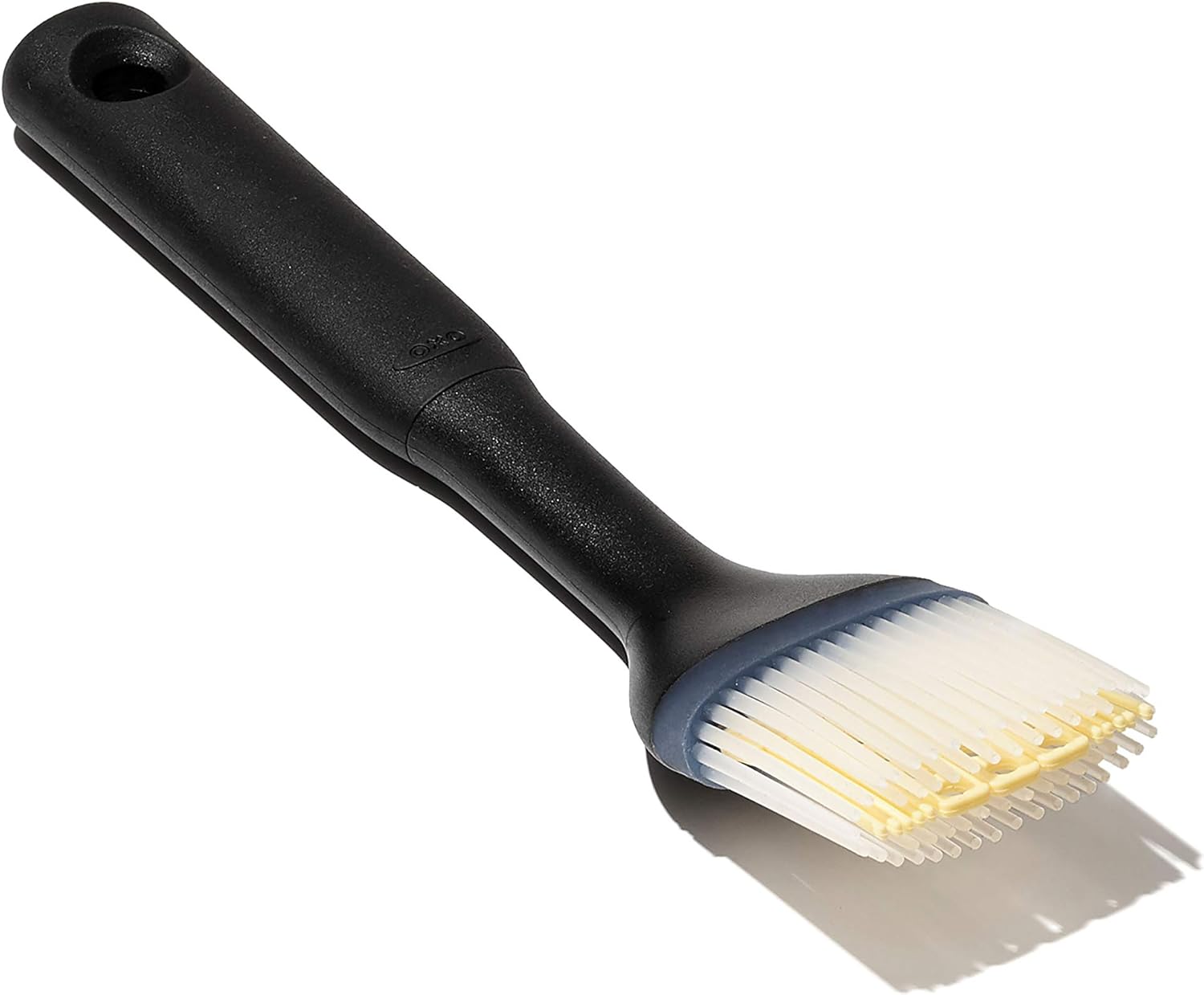 OXO Silicone Basting Brush on a kitchen counter